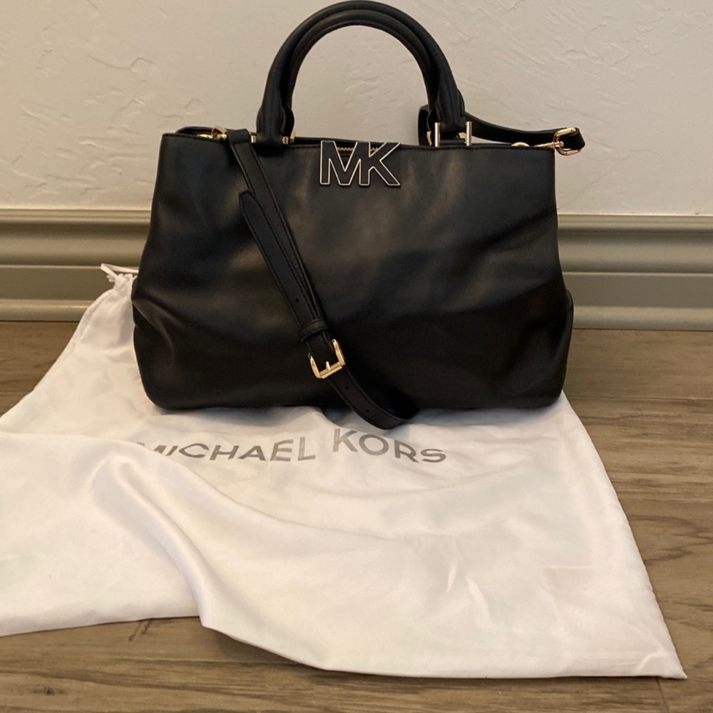 Authentic Michael Kors black smooth leather handbag with gold details